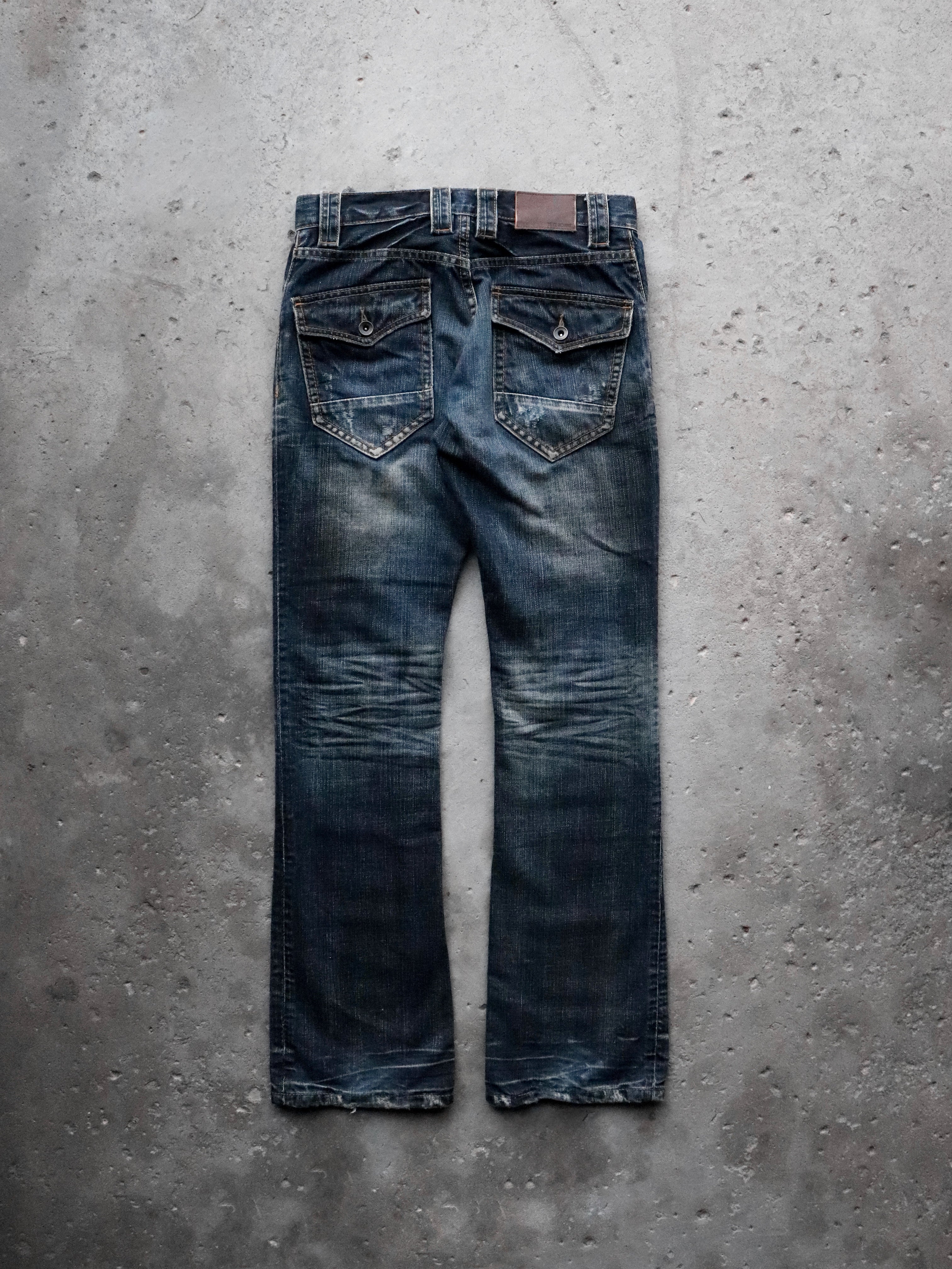 TÊTE HOMME REPAIRED BOOTCUT DENIM