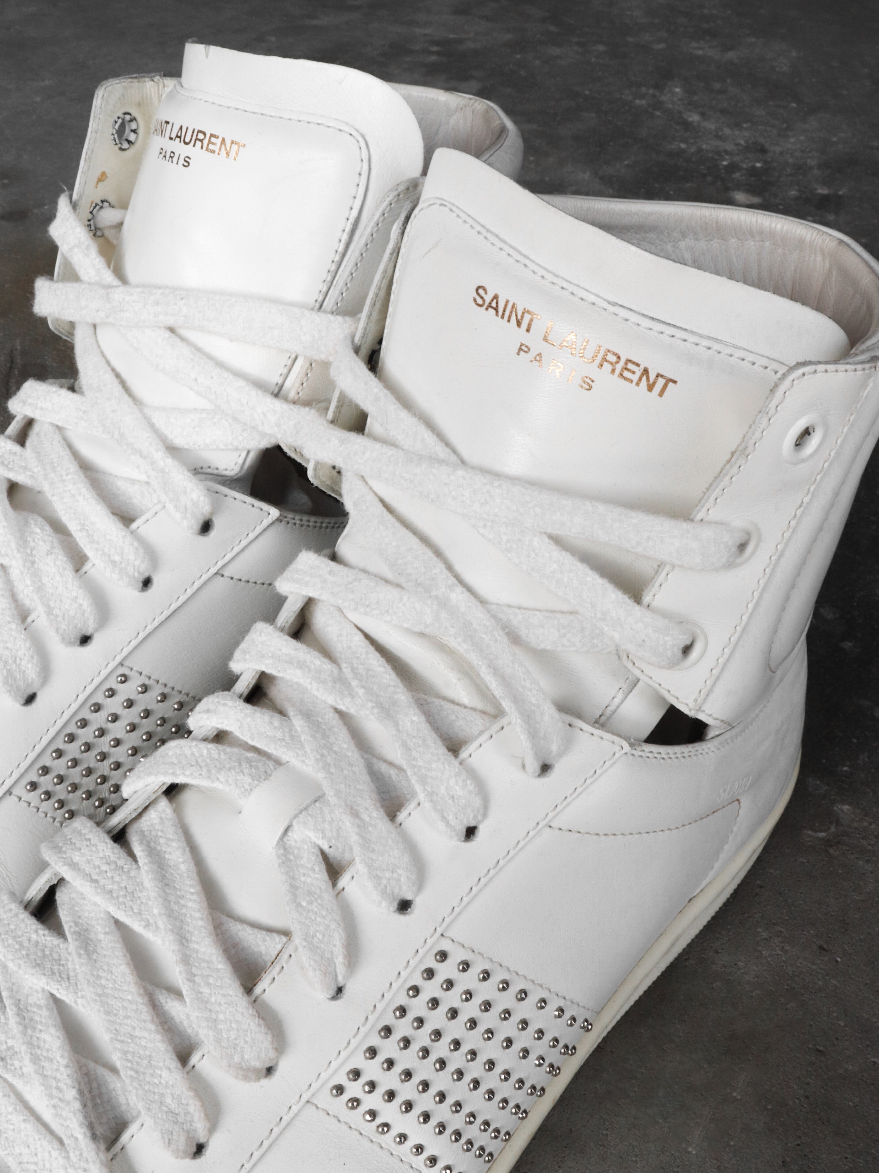SAINT LAURENT PARIS SL/01H STUDDED SNEAKERS
