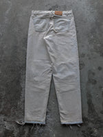 Load image into Gallery viewer, LEVI’S 550 CREAM RELEASED HEM DENIM - 1990S - LOST ENDS FOUND
