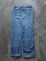 Load image into Gallery viewer, LEVI’S 619 DISTRESSED ORANGE TAB DENIM - 1990s - LOST ENDS FOUND
