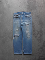 Load image into Gallery viewer, LEVI&#39;S 501 FADED &amp; REPAIRED INDIGO DENIM - 1990S  ( 32 x 31 ) - LOST ENDS FOUND
