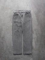 Load image into Gallery viewer, LEVI&#39;S 501 RELEASED HEM CEMENT DENIM - 1990S
