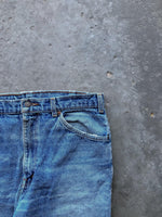 Load image into Gallery viewer, LEVI’S 619 DISTRESSED ORANGE TAB DENIM - 1990s - LOST ENDS FOUND
